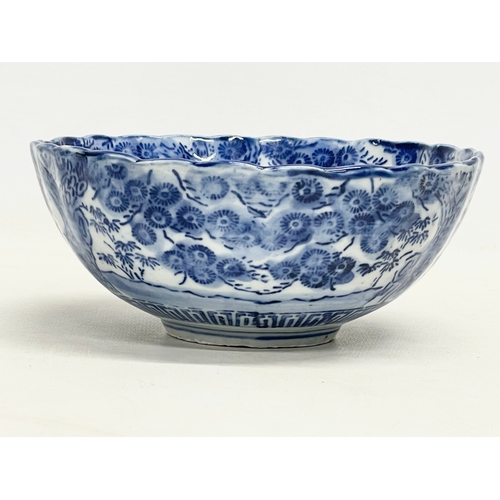 41 - A 19th century Japanese blue and white porcelain bowl on stand. Bowl measures 16x6.5cm