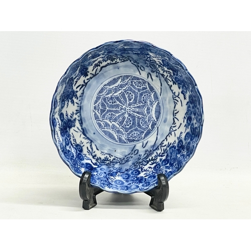 41 - A 19th century Japanese blue and white porcelain bowl on stand. Bowl measures 16x6.5cm