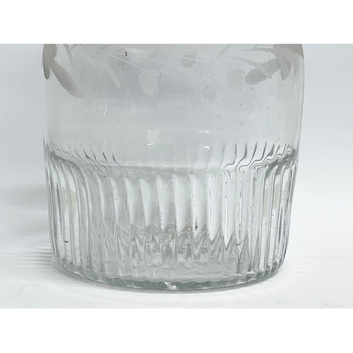 22 - An Irish Regency period small etched crystal decanter and stopper. Circa 1800-1810. 22cm