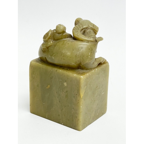 53 - A 19th century Chinese jade figure. 5x4x8cm