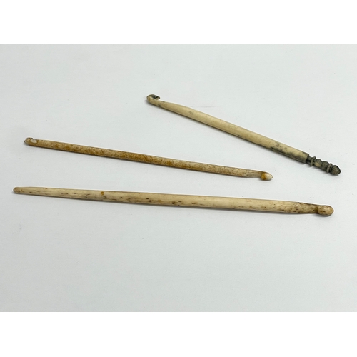 54 - A collection of 19th century bone. 3 19th century bone crochet hooks. 2 19th century bone pick forks... 