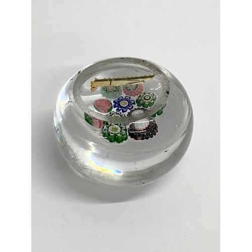 28 - A 19th century Clichy Millefiori miniature paperweight. Circa 1840-1860. 4.5x3.5cm