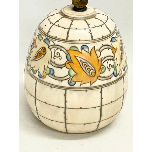 77 - A Charlotte Rhead pottery table lamp. 17x27cm