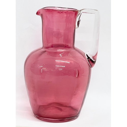 58 - A collection of Victorian Cranberry and Ruby Glass. Largest Ruby Glass jug measures 18x18cm. A pair ... 