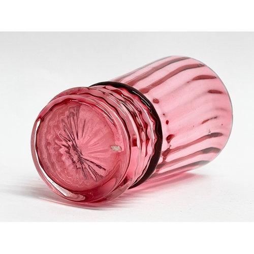 58 - A collection of Victorian Cranberry and Ruby Glass. Largest Ruby Glass jug measures 18x18cm. A pair ... 