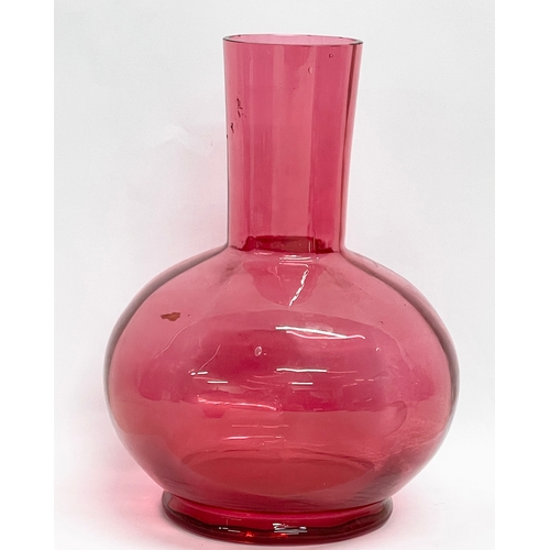 58 - A collection of Victorian Cranberry and Ruby Glass. Largest Ruby Glass jug measures 18x18cm. A pair ... 