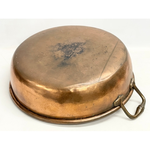 62 - A large Victorian copper 2 handled jam pan. 55x44x16cm