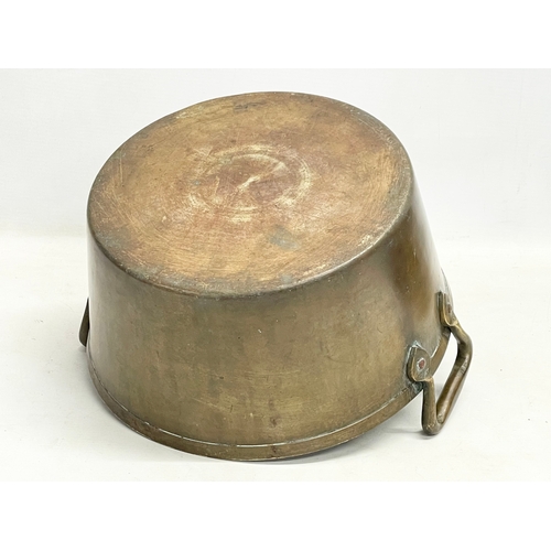 64 - A mid 19th century brass 2 handled preserving pan. 30x28x18cm