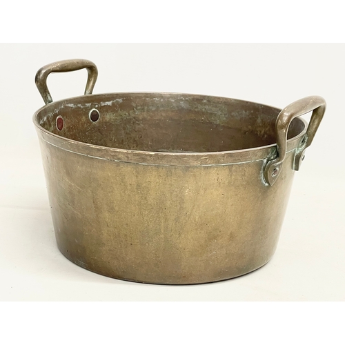 64 - A mid 19th century brass 2 handled preserving pan. 30x28x18cm