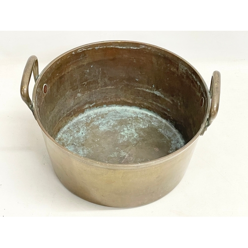 64 - A mid 19th century brass 2 handled preserving pan. 30x28x18cm