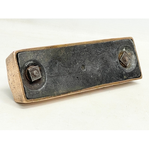 94 - A Victorian bronze doorstop. 17x5x5cm