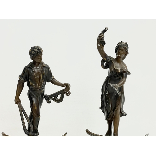 130 - A pair of late 19th century French spelter figures. 32.5cm