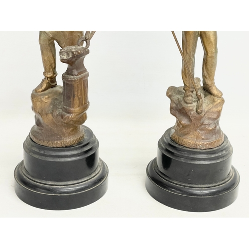 131 - A pair of late 19th century French spelter figures. 33cm