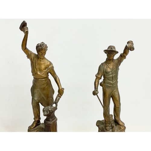 131 - A pair of late 19th century French spelter figures. 33cm