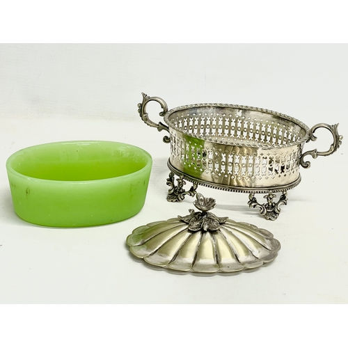 141 - A Victorian ornate pierced silver plated butter dish with green opaline glass. 21x11x11cm