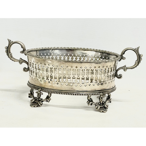 141 - A Victorian ornate pierced silver plated butter dish with green opaline glass. 21x11x11cm