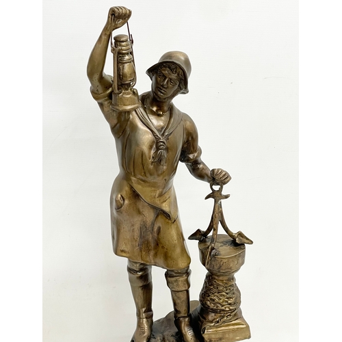 149 - A large early 20th century brass sailor figure. 71cm