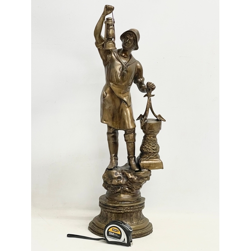 149 - A large early 20th century brass sailor figure. 71cm