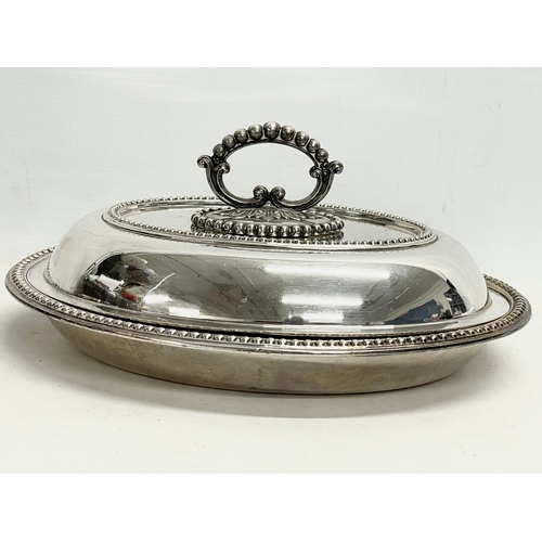 154 - 4 early 20th century silver plated food warmers. 30x21x15cm