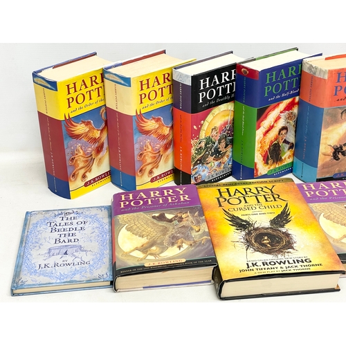 163 - A collection of Harry Potter books.