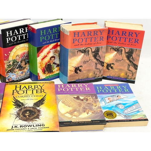 163 - A collection of Harry Potter books.