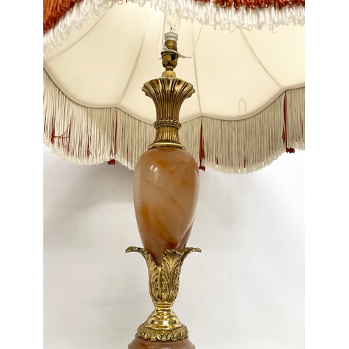 164 - A large vintage ornate brass and onyx table lamp. Base measures 68cm. 97cm including shade.