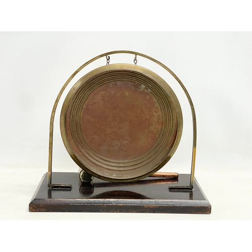 165 - A late 19th century brass gong. 38x21x34cm