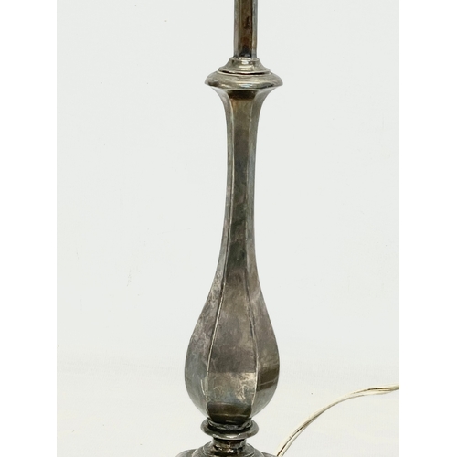 180 - An early 20th century silver plated brass table lamp. 15x31cm