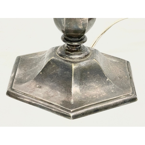 180 - An early 20th century silver plated brass table lamp. 15x31cm