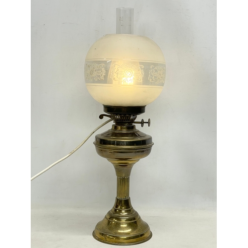 181 - A vintage Victorian style brass table lamp. 57cm