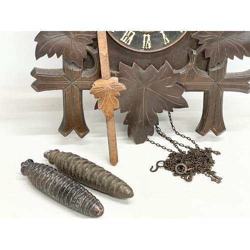 183 - A late 19th century Black Forest cuckoo clock. 34x45cm