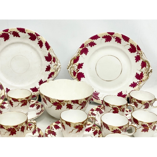 187 - A 32 piece 19th century tea service. Stamped F. Simpson Newington Butts, London.