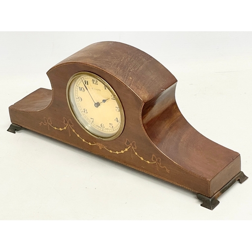 264 - An Edwardian inlaid mantle clock. Swiss works. 36x8x15cm