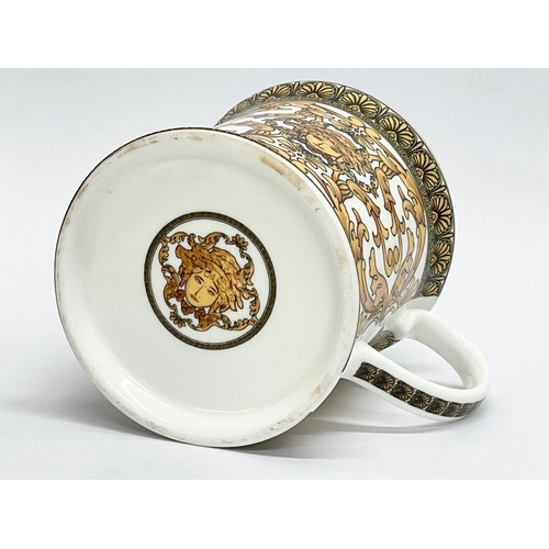 193 - A collection of 11 ‘Medusa’ Rosenthal Versace style mugs.