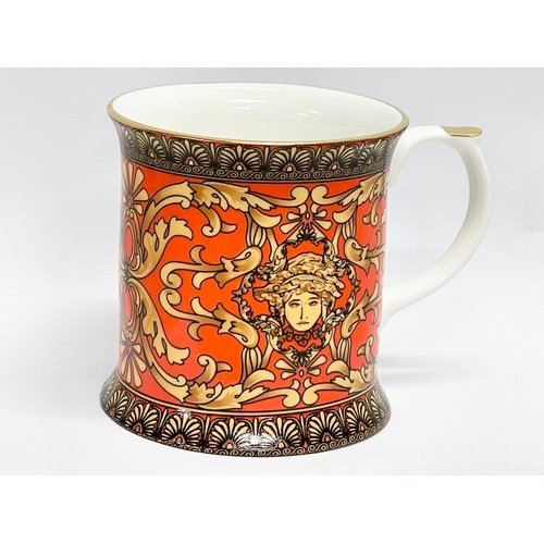 193 - A collection of 11 ‘Medusa’ Rosenthal Versace style mugs.