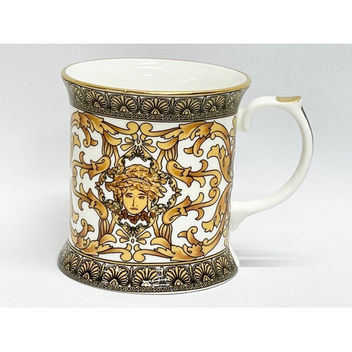 193 - A collection of 11 ‘Medusa’ Rosenthal Versace style mugs.