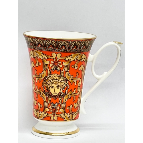 193 - A collection of 11 ‘Medusa’ Rosenthal Versace style mugs.