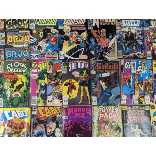 225 - A collection of vintage 1980s Marvel Universe Comic books including She-Hulk, Power Pack, Cable, Dar... 