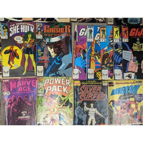 225 - A collection of vintage 1980s Marvel Universe Comic books including She-Hulk, Power Pack, Cable, Dar... 