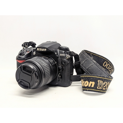 242 - A Nikon D200 Digital Camera with collection of lenses including Sigma DG, Hoya, Nikon AF Nikkor. Wit... 