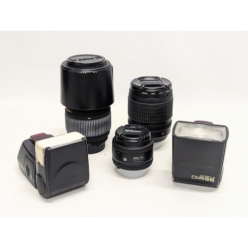 242 - A Nikon D200 Digital Camera with collection of lenses including Sigma DG, Hoya, Nikon AF Nikkor. Wit... 