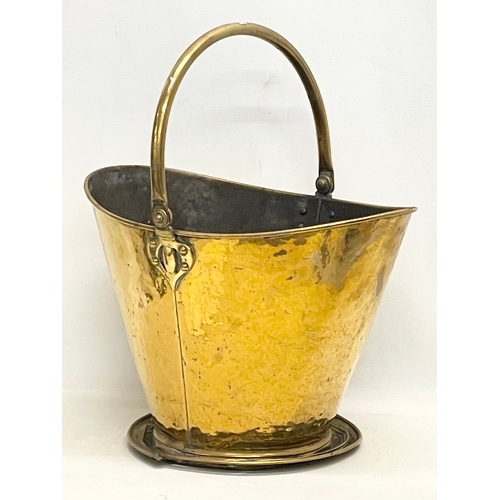 A Victorian brass coal bucket. 43x50cm