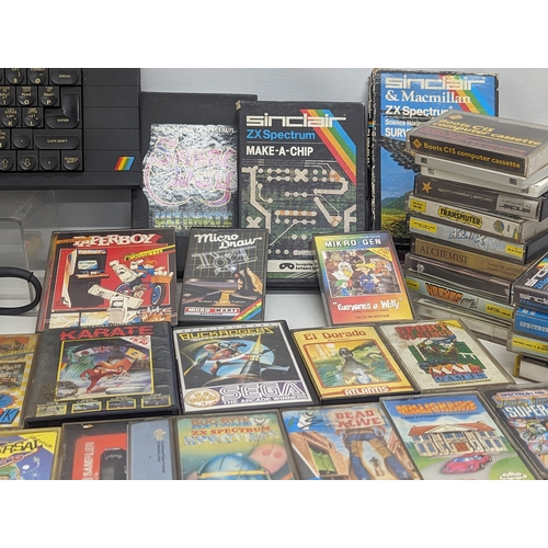 251 - A vintage Sinclair ZX Spectrum Plus keyboard with games, etc.