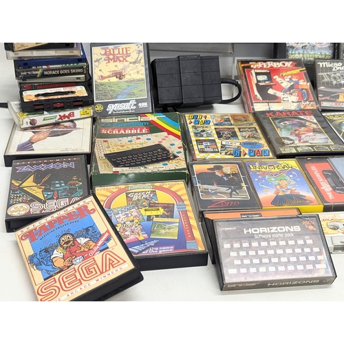 251 - A vintage Sinclair ZX Spectrum Plus keyboard with games, etc.