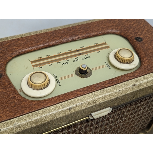 569 - 2 vintage Sky Queen radios.