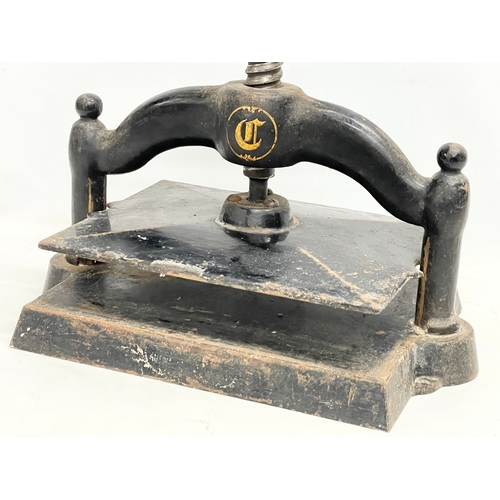 270B - A Victorian cast iron book press. Closed 45x30x31.5cm