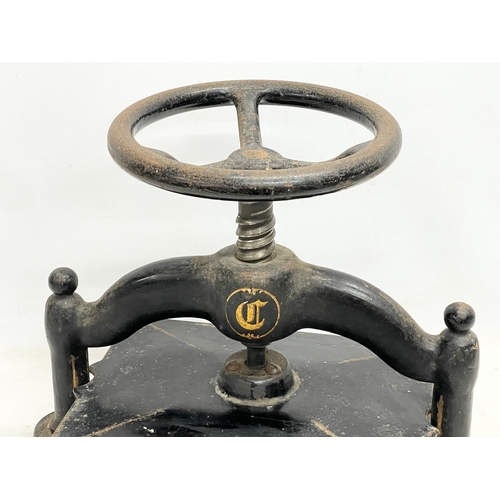 270B - A Victorian cast iron book press. Closed 45x30x31.5cm