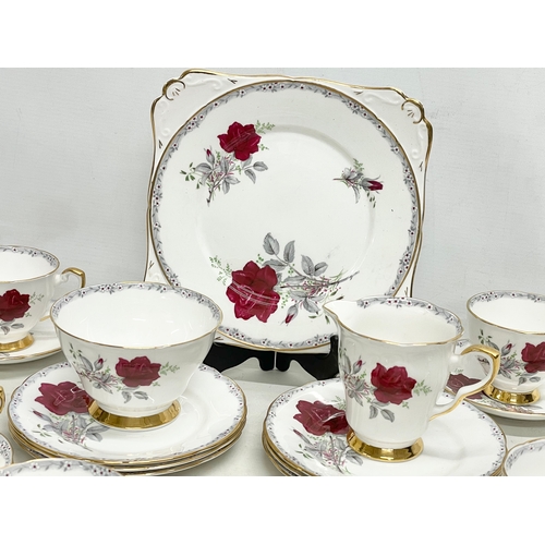 581 - A 21 piece Royal Stafford ‘Roses to Remember’ tea set.