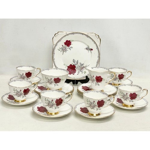 581 - A 21 piece Royal Stafford ‘Roses to Remember’ tea set.