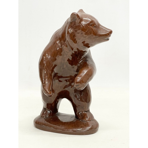 385L - An early to mid 20th century glazed terracotta bear. 20cm